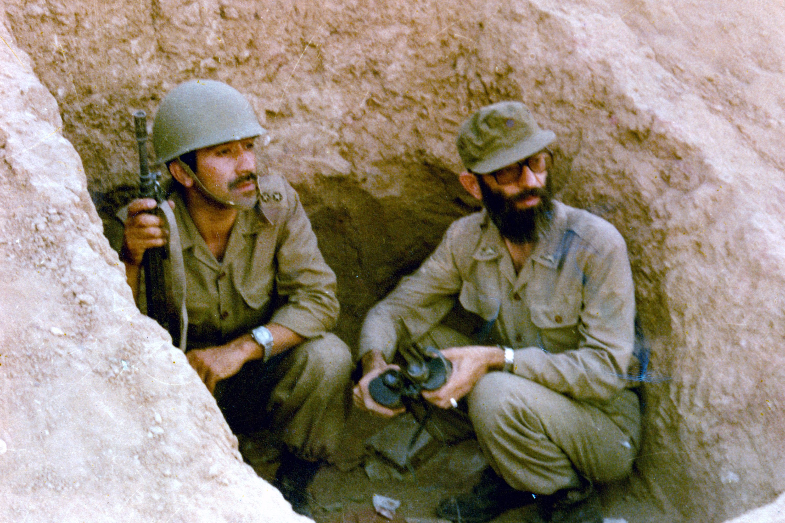 Ayatollah Khamenei in a trench at the front