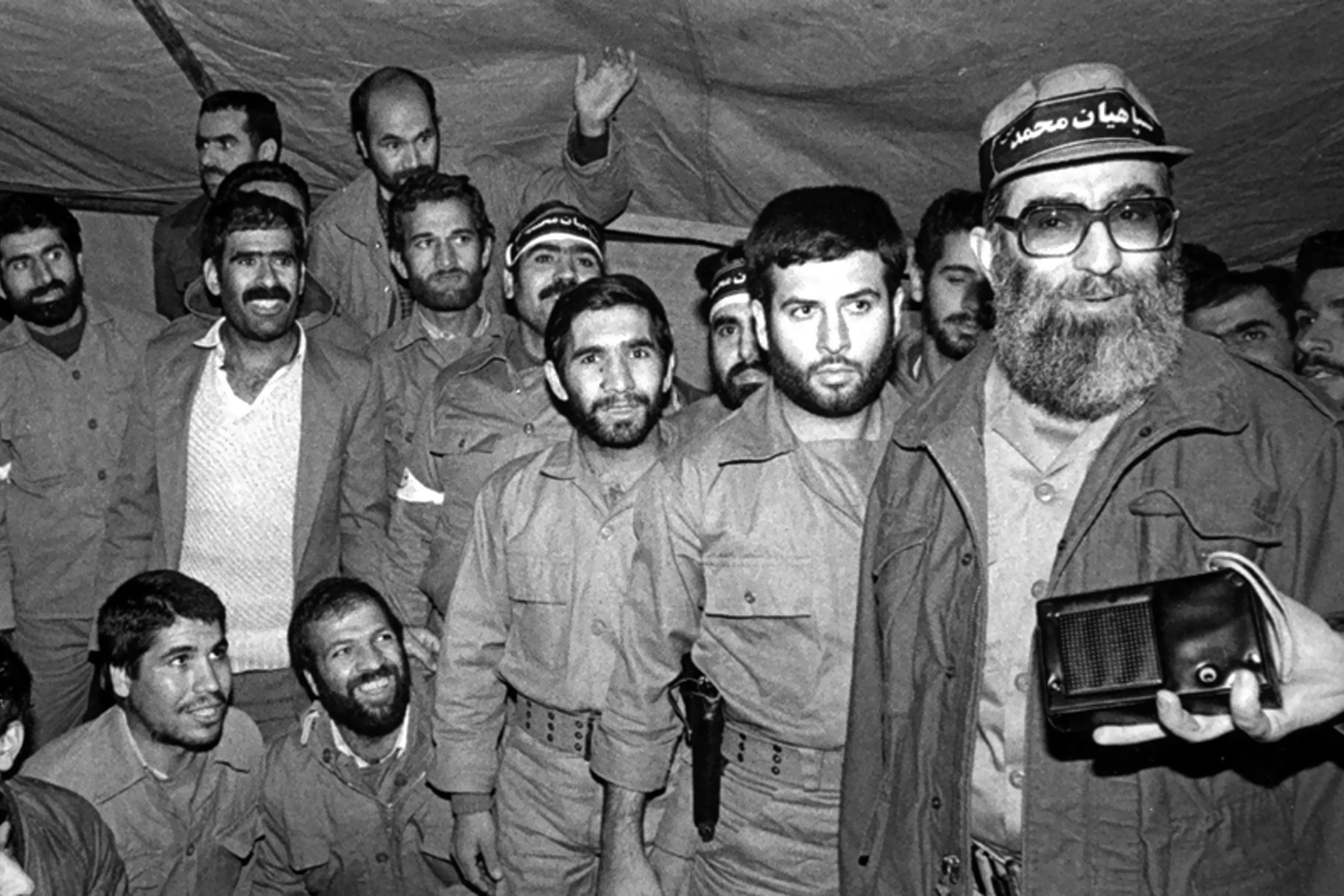 Ayatollah Khamenei in military uniform during the war